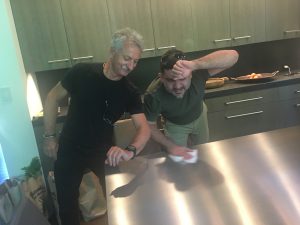 Peter and Jose Achi, Director of Design Development at Clodagh Design, prep a countertop for its close-up. Photo: Ellen Sweeney.